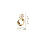 Modern Twist Dangle Earrings White Nestasia