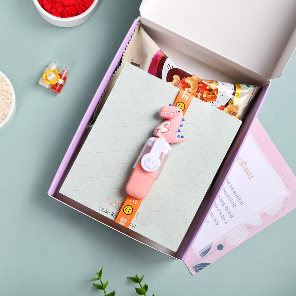 Orange Dino Rakhi Gift Set Nestasia