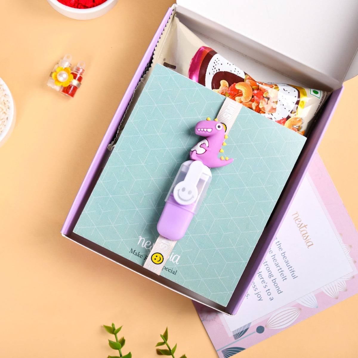 Purple Dino Rakhi Gift Set Nestasia
