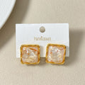 Quiet Twist Stud Earrings White Nestasia