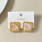 Quiet Twist Stud Earrings White Nestasia
