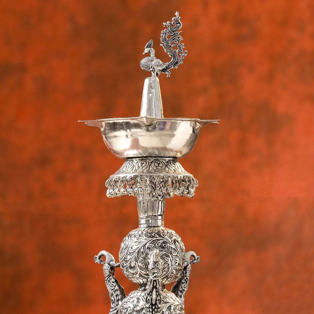 Brass Silver Plated Peacock Design Samai Oil Lamp (23.8 Inch) Vedansh Craft