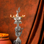 Brass Silver Plated Peacock Design Samai Oil Lamp (23.8 Inch) Vedansh Craft