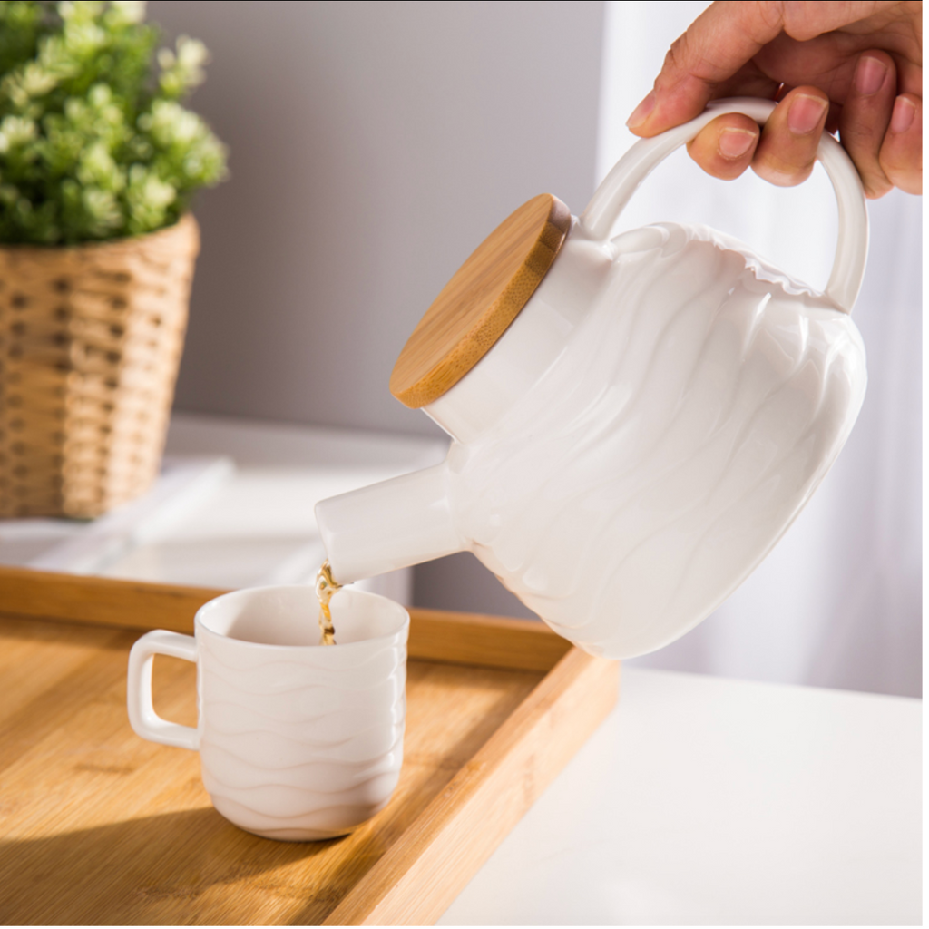 MAGNIFIQUE waves teapot and teacups set Nestasia