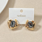 Noir Twist Statement Studs Nestasia