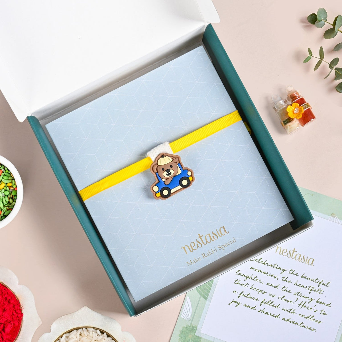 Teddy In A Toy Car Kids Rakhi Set Nestasia