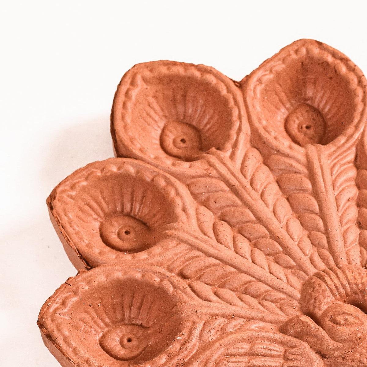 Peacock Feather Engraved Terracotta Diyas Set Of 24 Nestasia