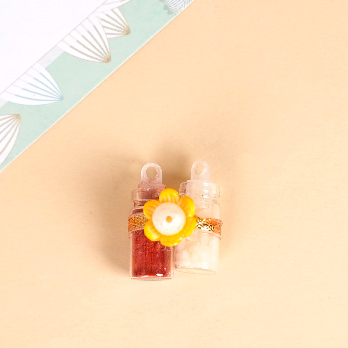 Vibrant Floral Rakhi Hamper For Bhaiya And Bhabhi Nestasia