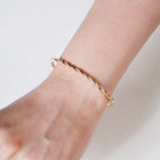 Waves And Swirls Gold Bracelet Nestasia