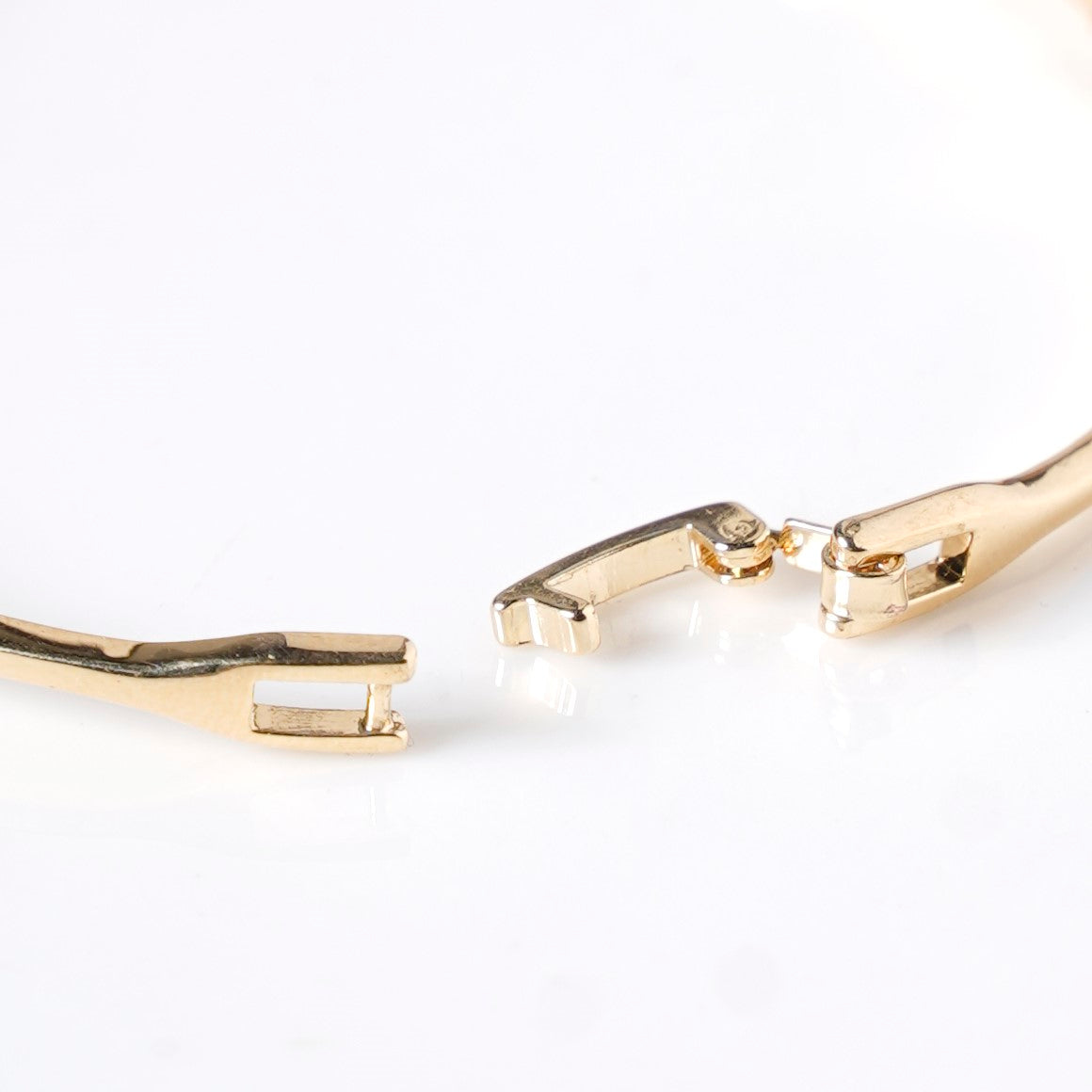 Waves And Swirls Gold Bracelet Nestasia