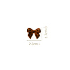 Animal Printed Bow Studs Nestasia