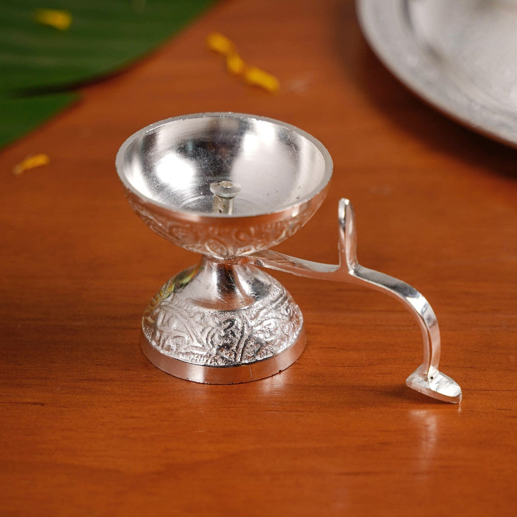 Embossed Silver Pooja Thali Set Of 7 With Kalash Spoon Bowl Bell Diya Nestasia