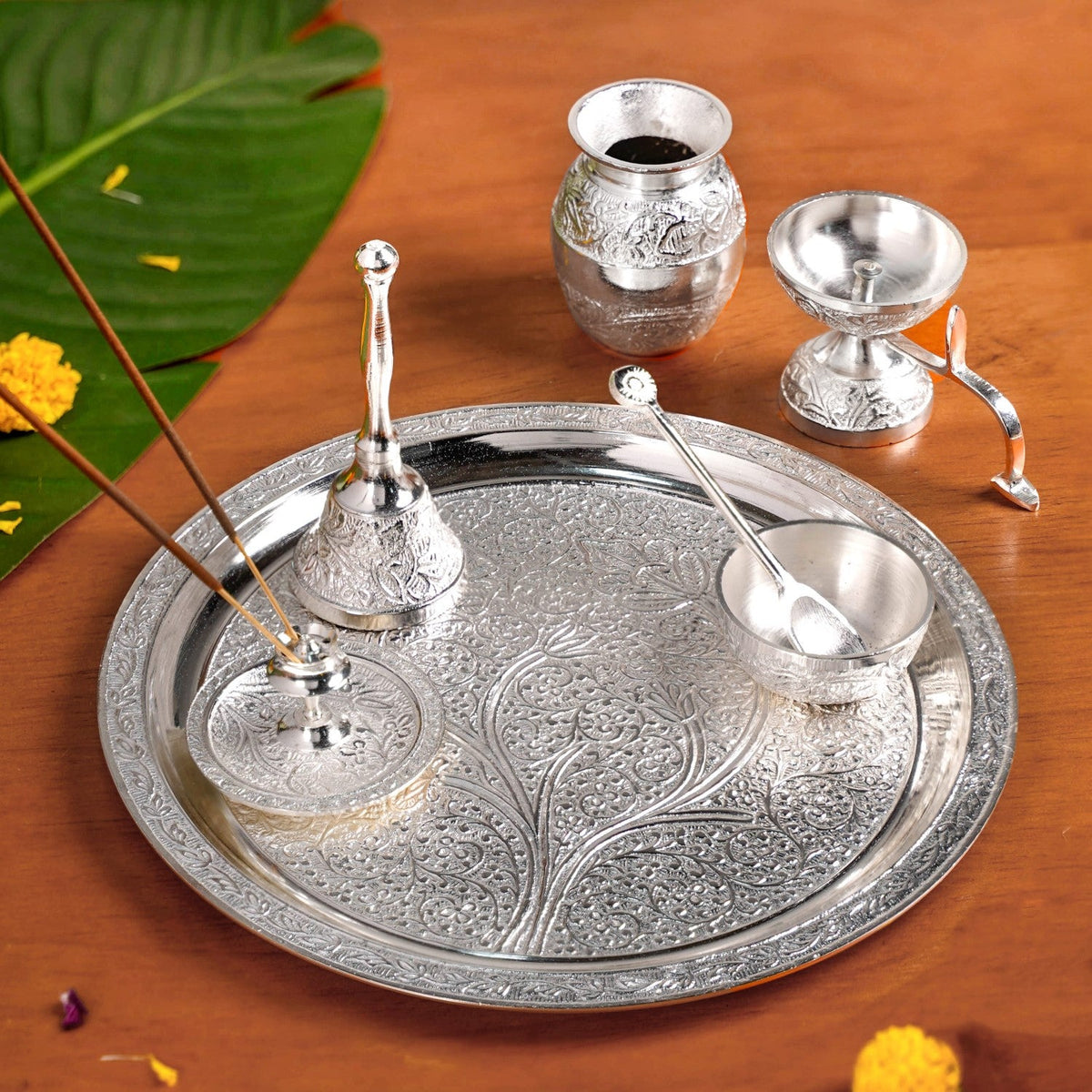 Embossed Silver Pooja Thali Set Of 7 With Kalash Spoon Bowl Bell Diya Nestasia