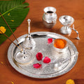 Embossed Silver Pooja Thali Set Of 7 With Kalash Spoon Bowl Bell Diya Nestasia