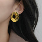 Fluid Hollow Oval Gold Statement Earrings Nestasia
