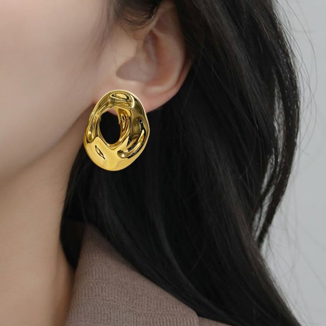 Fluid Hollow Oval Gold Statement Earrings Nestasia