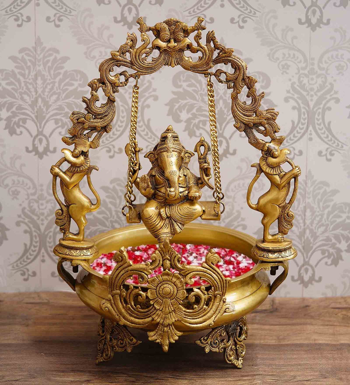 Golden Brass Decorative Lord Ganesha On Swing Premium Brass Urli Kafalo