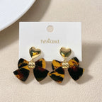 Heart And Bow Dangle Earrings Nestasia