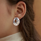 Fluid Hollow Oval Silver Statement Earrings Nestasia