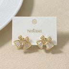Iridescent Pearl Bow Stud Earrings Nestasia