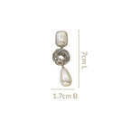 Pearl And Silver Overlapping Ring Danglers Nestasia