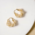 Spiral Glow Hoops Gold Nestasia