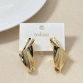 Twisted Form Drop Earrings Gold Nestasia